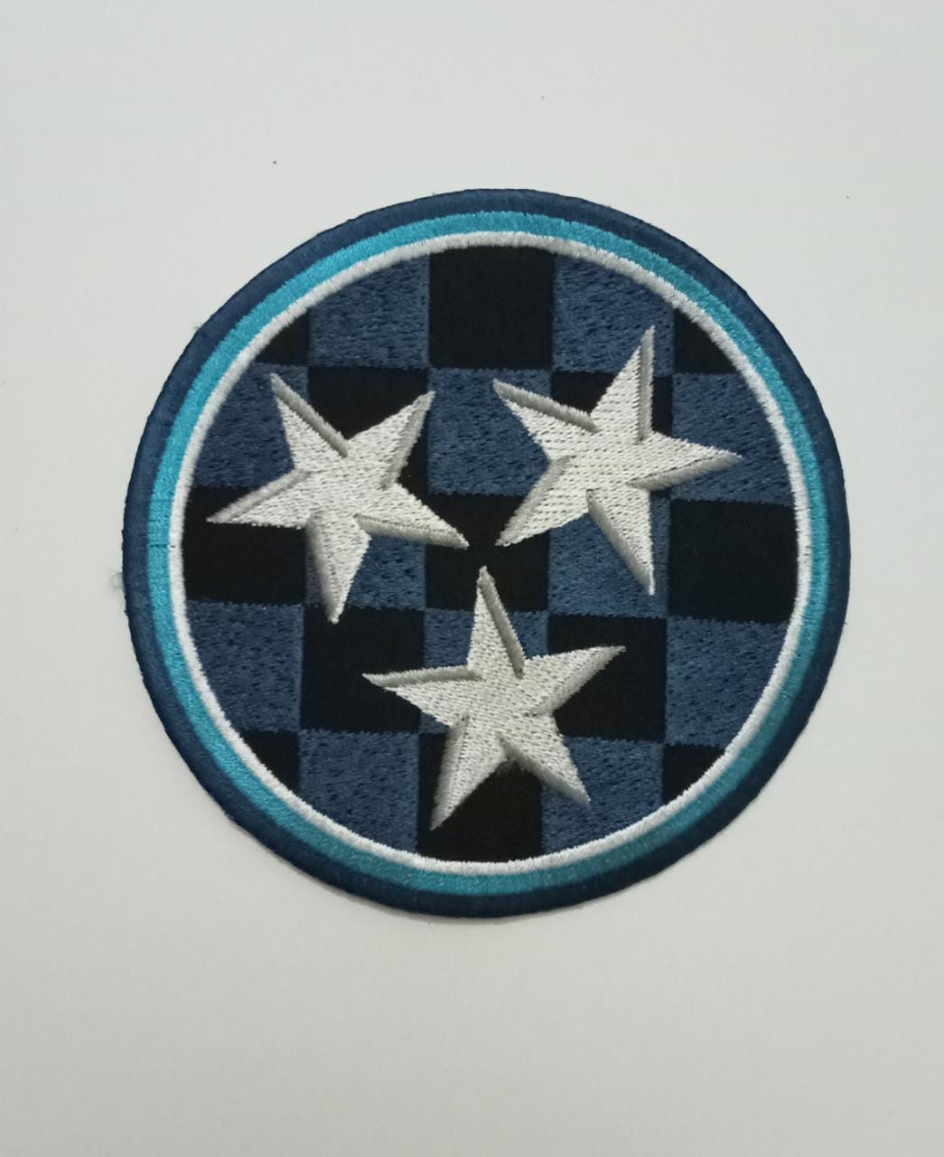 Tri-star embroidered patch